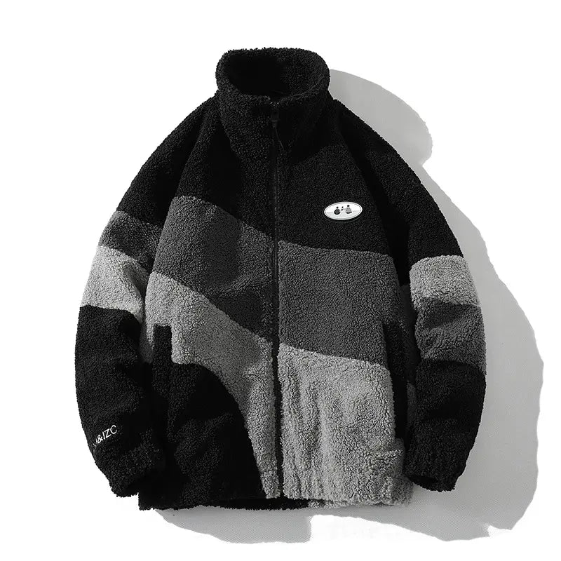 Chaqueta de forro polar de franjas para hombre con franjas negras y grises, con una superficie acolchada y texturizada, diseñada para la ropa de abrigo de invierno.