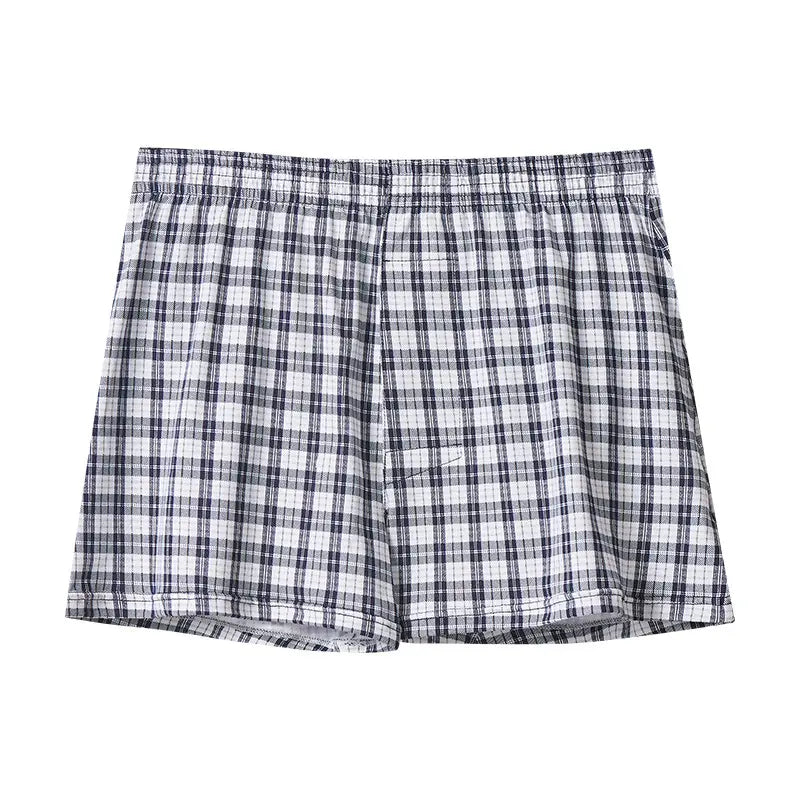 men’s plus size cotton striped and plaid boxer shorts featuring black and white plaid design with an elastic waistband.