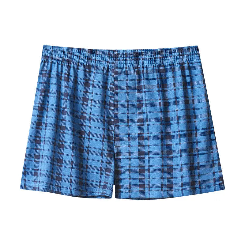 Men’s plus size cotton striped and plaid boxer shorts in blue and dark blue plaid with an elastic waistband.