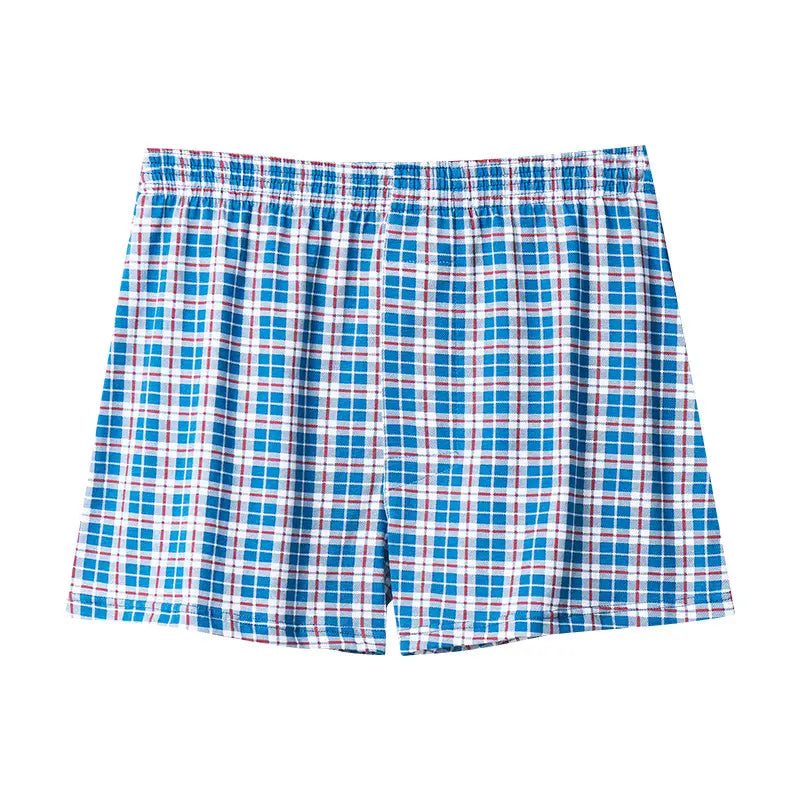 Men’s plus size cotton striped and plaid boxer shorts featuring blue white and red plaid cotton fabric with an elastic waistband.