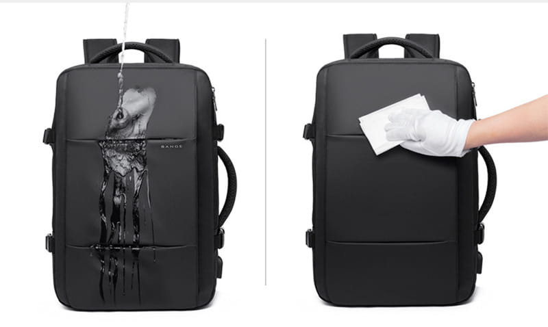 Black tactical style business backpack with a water resistant design and subtle brand logo on the front ideal for large capacity laptop storage.