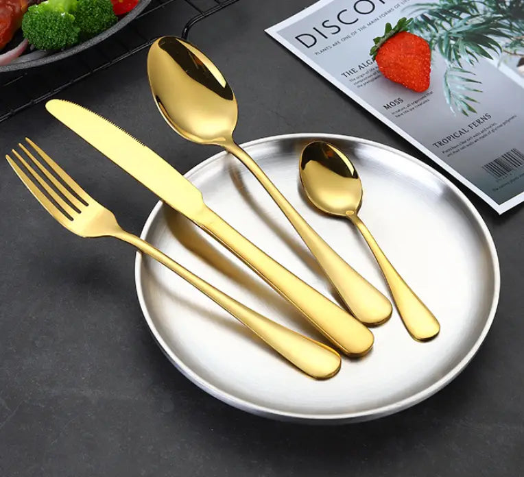 gold stainless steel cutlery set 24 piece tableware featuring a fork knife and two spoons with sleek modern handles