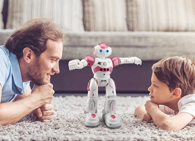 Un juguete inteligente de robot color blanco y rosa con ojos azules presenta extremidades articuladas y un diseño elegante para bailar con control por gestos.