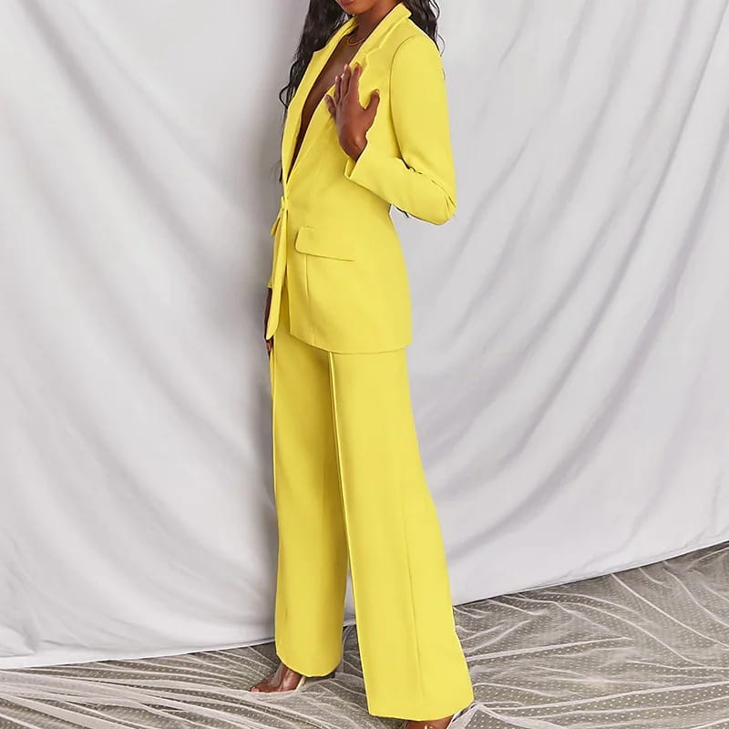 Bright yellow tailored blazer and wide-leg trousers suit set for women made from structured fabric ideal for professional or formal occasions.