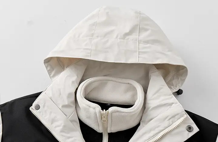 Chaqueta de caparazón impermeable 3 en 1 para parejas con capucha acolchada blanca, cuello con forro de forro polar suave y caparazón exterior negro
