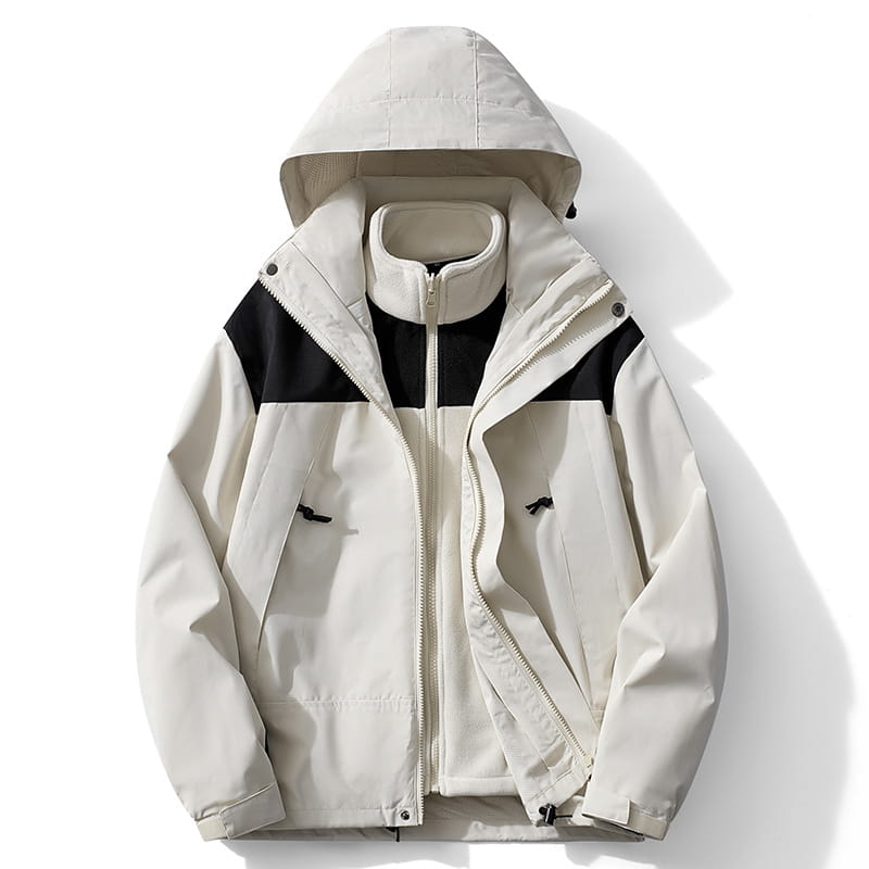 Chaqueta de caparazón impermeable 3 en 1 para parejas color beige y negro, con capucha y diseño acolchado, mostrada desde el frente