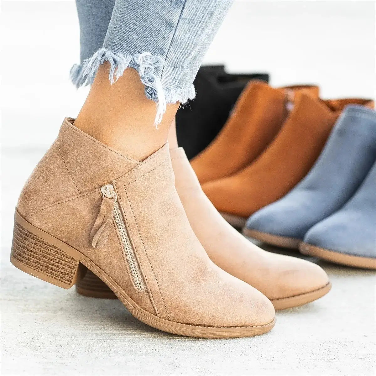tan suede ankle boot with low block heel and side zipper closure from dr martens suede chunky heel side zip boots collection