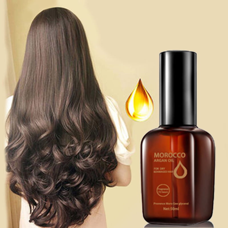 Un frasco elegante de vidrio ámbar con tapa negra, etiquetado como aceite de argán de Marruecos, que contiene 50 ml de suero capilar nutritivo para el cuidado del cabello seco y dañado.