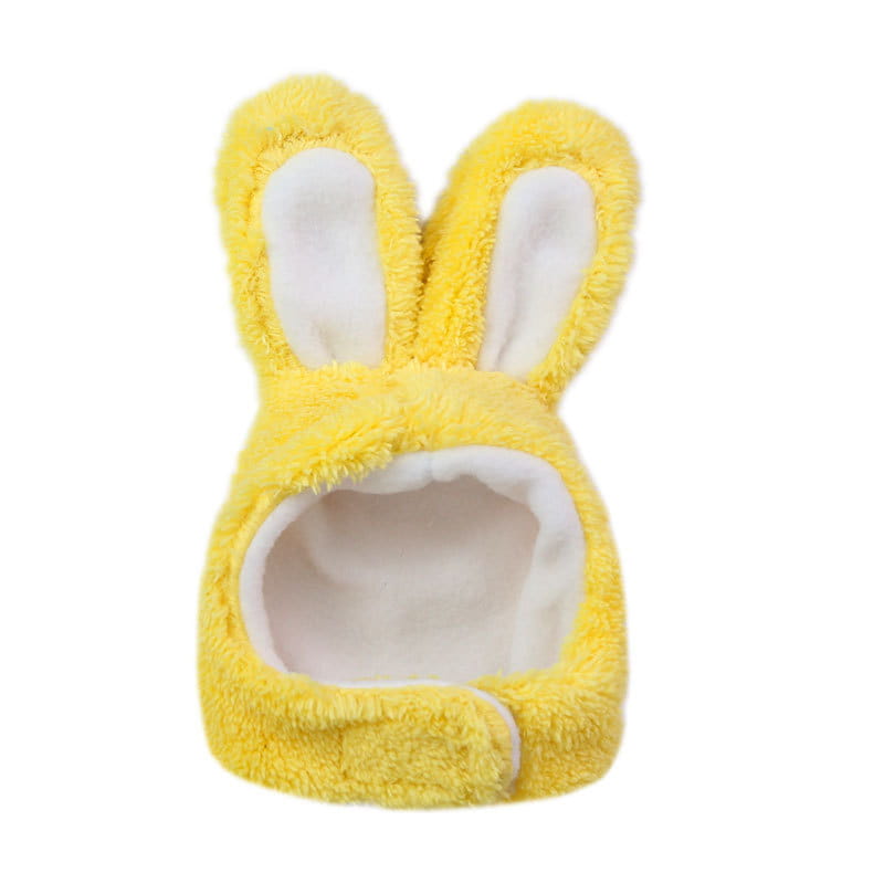 A soft, fluffy yellow plush bunny ear pet hat with white inner lining.