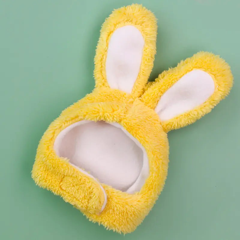 Yellow fluffy plush bunny ear pet hat with white inner lining designed for pets