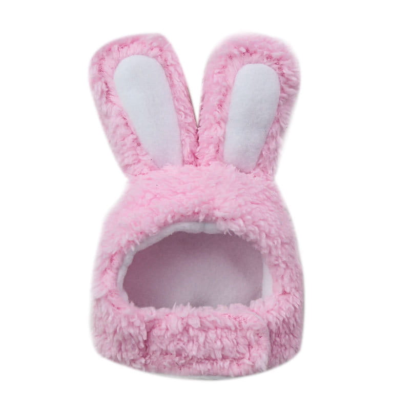 Plush bunny ear pet hat in pink fuzzy material with white inner lining.