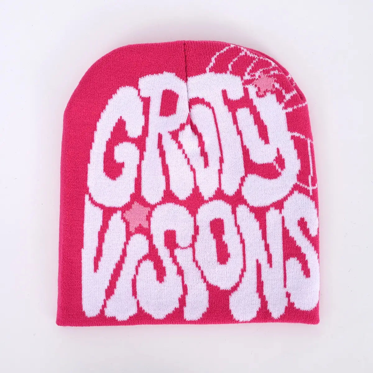A vibrant pink knitted letter jacquard beanie hat featuring bold white groty visions lettering and a subtle spiderweb design.