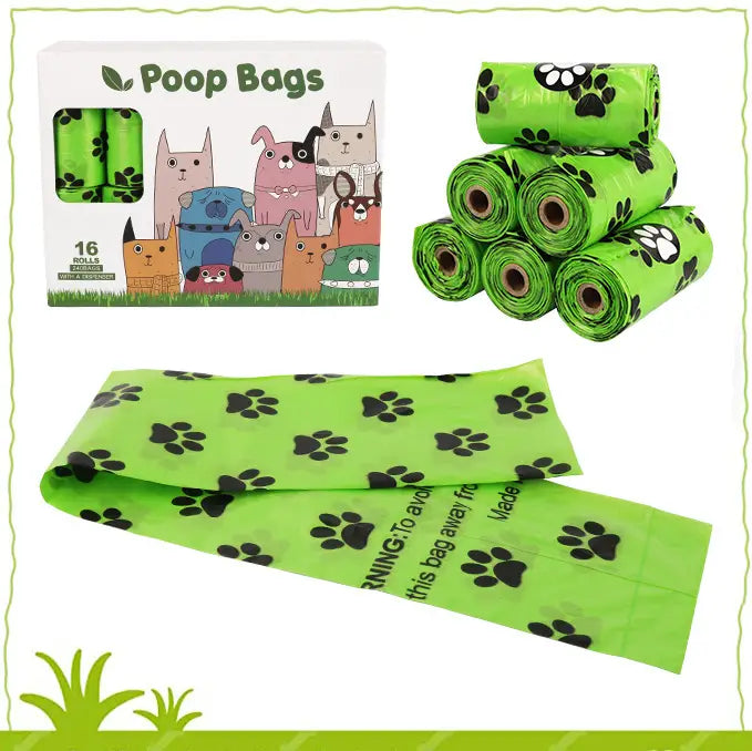Bright green dog poop bags with black paw prints packaged in a box featuring cartoon animals for use with a dispenser and refill rolls.