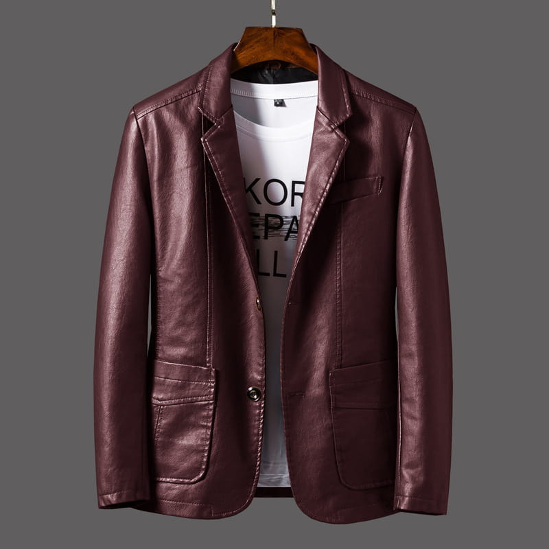 A sleek burgundy men’s faux leather double breasted jacket with two front pockets.