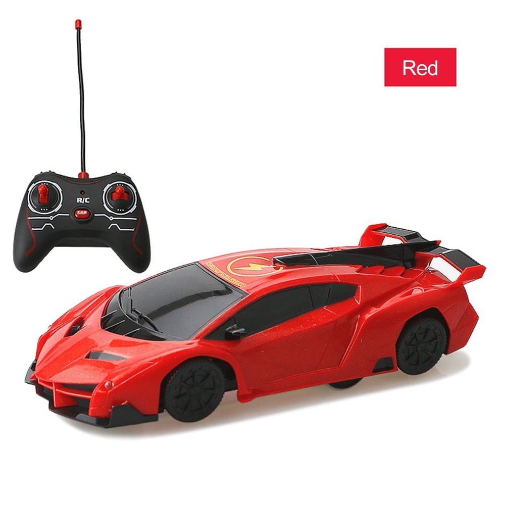 Red remote-controlled wall climbing sports car with black accents and a sleek aerodynamic design for gravity defying stunts.
