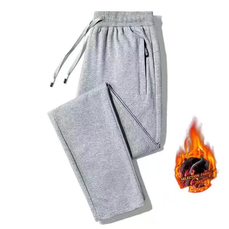 Gray heathered fleece lined mens winter jogger pants with black zipper accents and a drawstring waistband