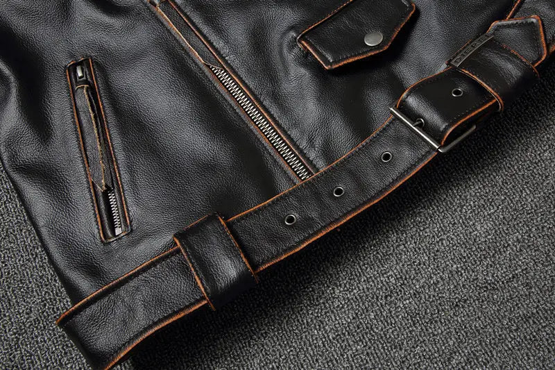 Men’s cowhide leather motorcycle biker jacket in black with brown stitching and silver zippers featuring lapels.