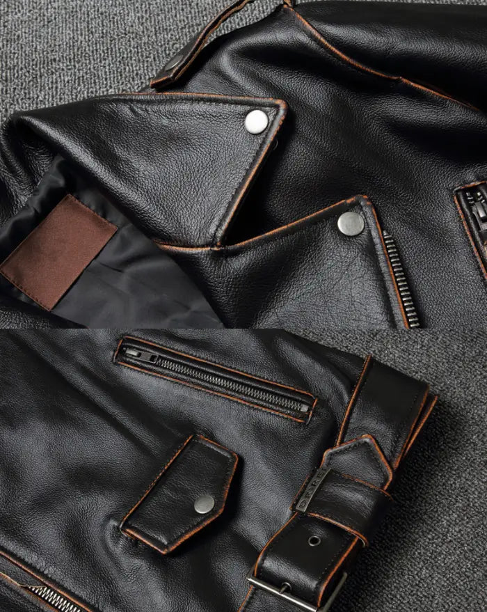 Men’s cowhide leather motorcycle biker jacket with lapels in black leather featuring brown stitching and silver snap buttons.