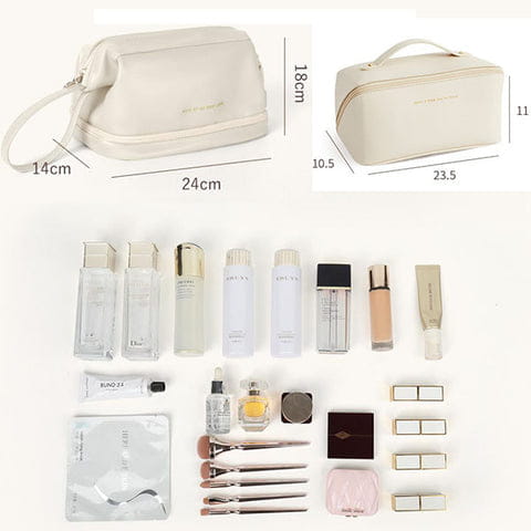 Cream-colored large capacity leather travel makeup bag organizer with soft texture, top handle, and zipper closure.