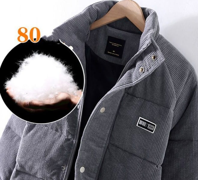 mens corduroy puffer jacket in gray with black inner lining and silver-toned snap buttons designed for retro winter warmth and style.