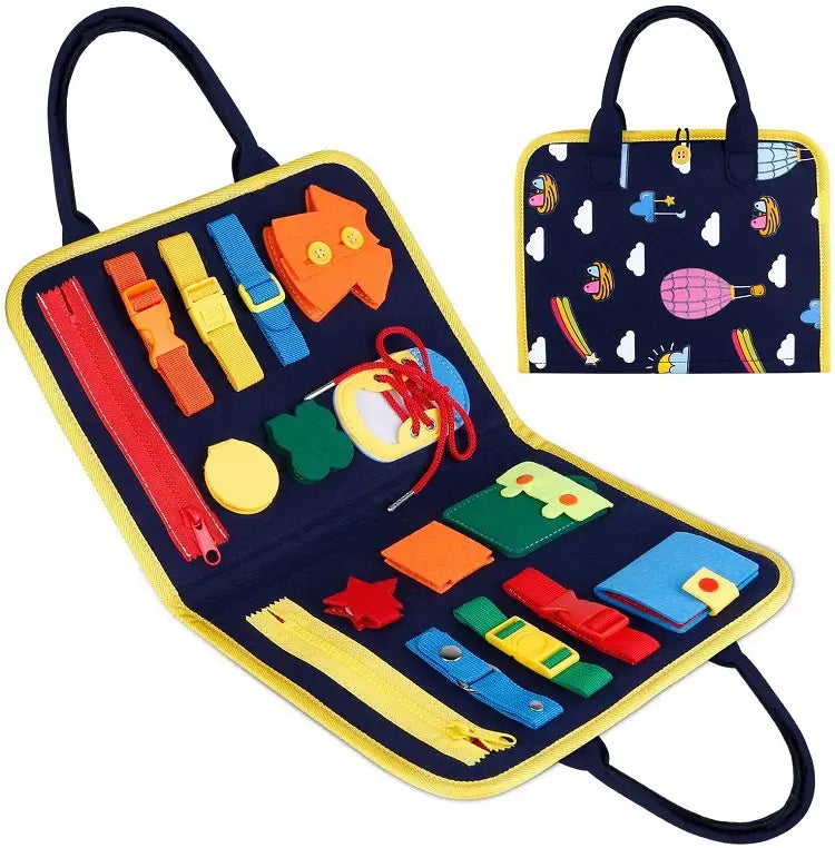 Navy blue fabric sensory activity bag with yellow trim featuring colorful tactile toys such as zippers buttons and shapes in a toddler busy board sensory felt learning toy.