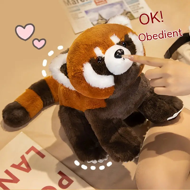 Ein weiches Stofftier, Rotfuchs-Palimpsest-Coati, Plüschtier, mit orangefarbenem, weißem und dunkelbraunem Fell