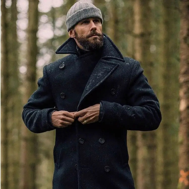 A dark navy woolen double-breasted peacoat with black buttons and a notched collar featured in the product titled olive green wool double-breasted coat.