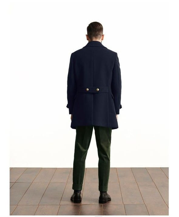 olive green wool double-breasted coat featuring a navy blue wool overcoat with gold-toned buttons.