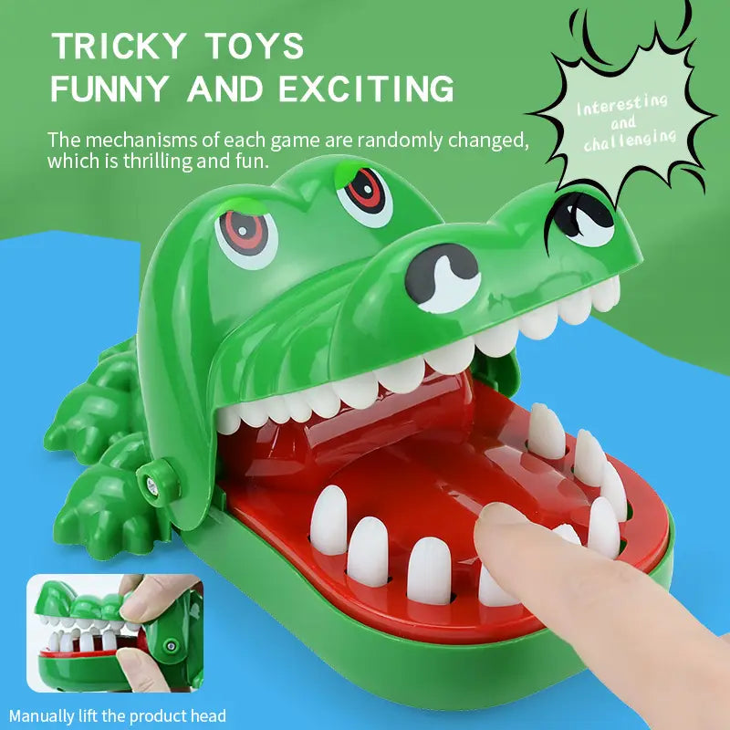 Green plastic crocodile biting finger game toy with red interior and white teeth designed as a playful interactive prank for kids.