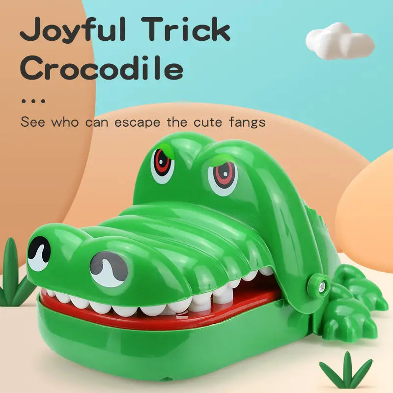Green plastic crocodile biting finger game toy with red interior and white teeth for interactive kids play.