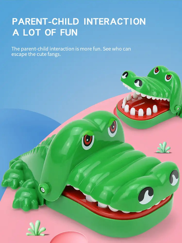Green plastic crocodile biting finger game toy with red interior and white teeth designed for interactive kids play.