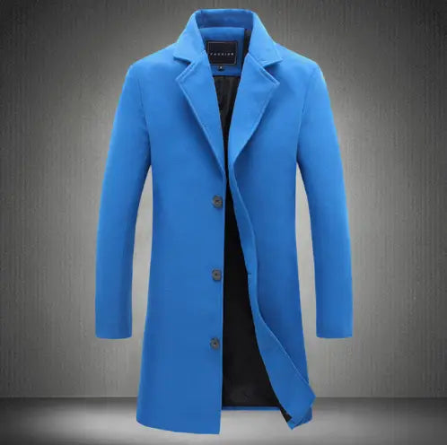 Men’s solid wool blend casual business overcoat in bright blue wool with a classic collar and dark buttons.