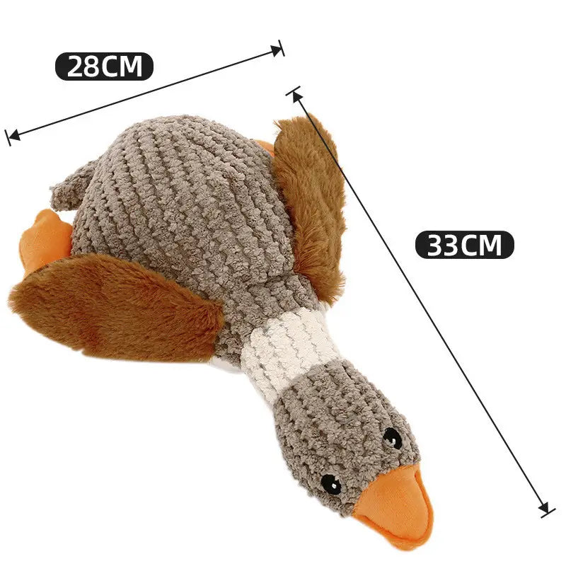 A plush duck dog toy made of knitted material with a gray body and brown wings designed to be bite resistant and suitable for molar chewing.