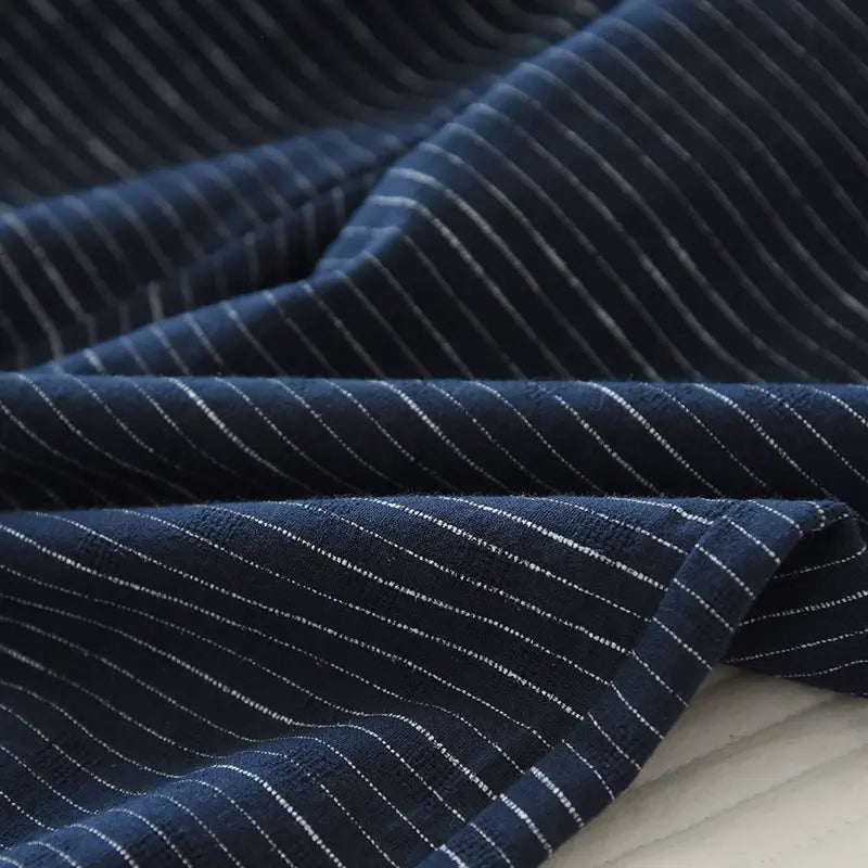Dark blue cotton kimono pajama set for men featuring fine white pinstripes.