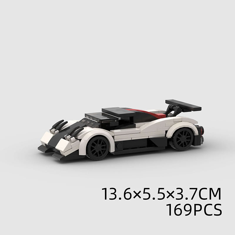 Voiture de course LEGO blanche et noire avec des accents rouges, présentant un design aérodynamique élégant et des roues détaillées, à partir de l’ensemble éducatif de blocs de construction pour voiture de course de type moc.