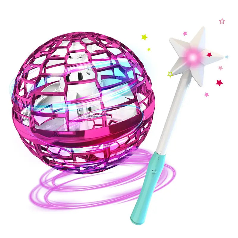 a vibrant pink and purple geometric flying orb ball boomerang spinner with a glowing star magic wand toy for interactive play