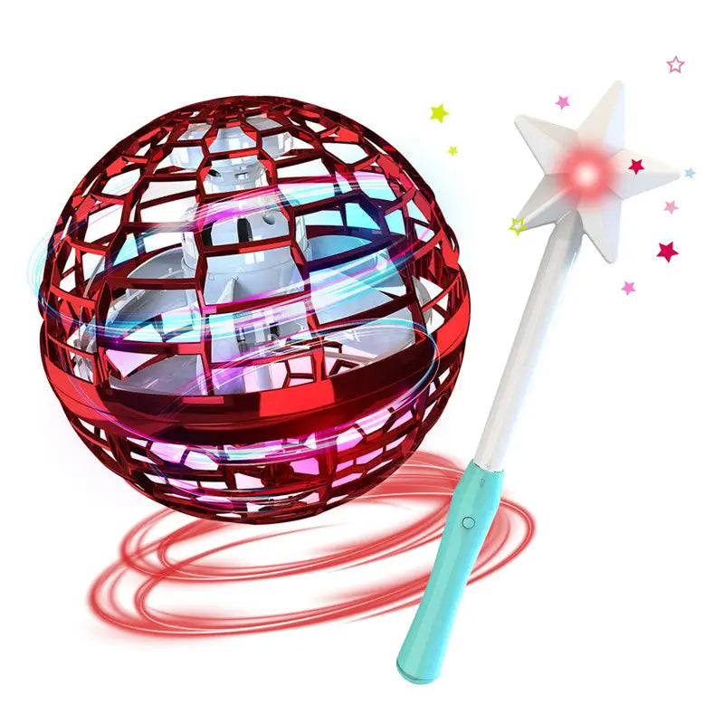 red translucent spherical flying orb ball boomerang spinner with glowing interior and a star-shaped magic wand toy beside it