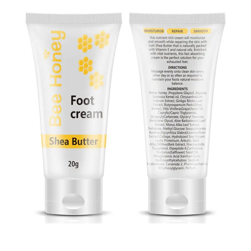 White tube of honey foot cream with yellow bee and honeycomb graphics labeled shea butter 20g from the honey foot cream and gel sock moisturizing set