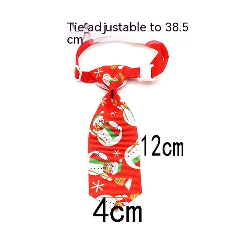 Red christmas-themed dog tie made of woven fabric featuring snowman and star patterns for festive holiday pet neckwear with adjustable design.