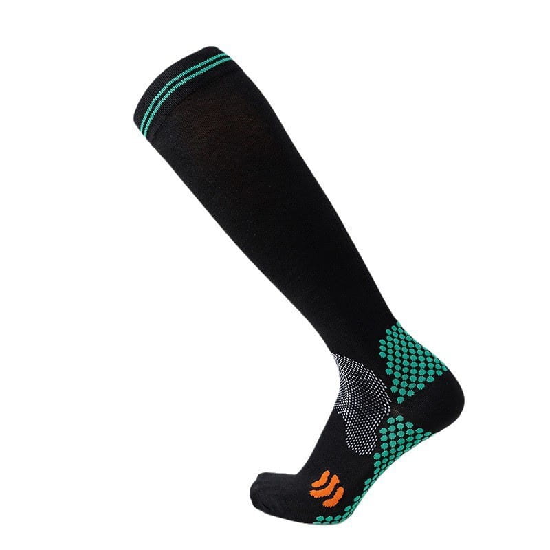 black athletic knee-high compression soccer sock with teal and orange accents and a textured grip pattern on the footbed designed for enhanced athletic performance
