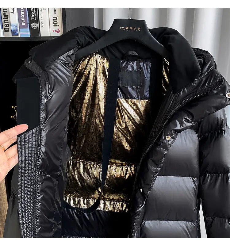 Black down jacket hooded quilted puffer coat in black with a shiny gold interior lining and quilted design.