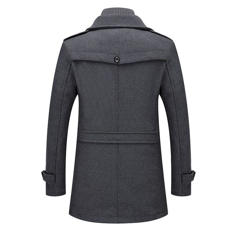 Dark gray woolen men’s winter overcoat with a high collar and buttoned flap pockets designed as a warm business jacket.