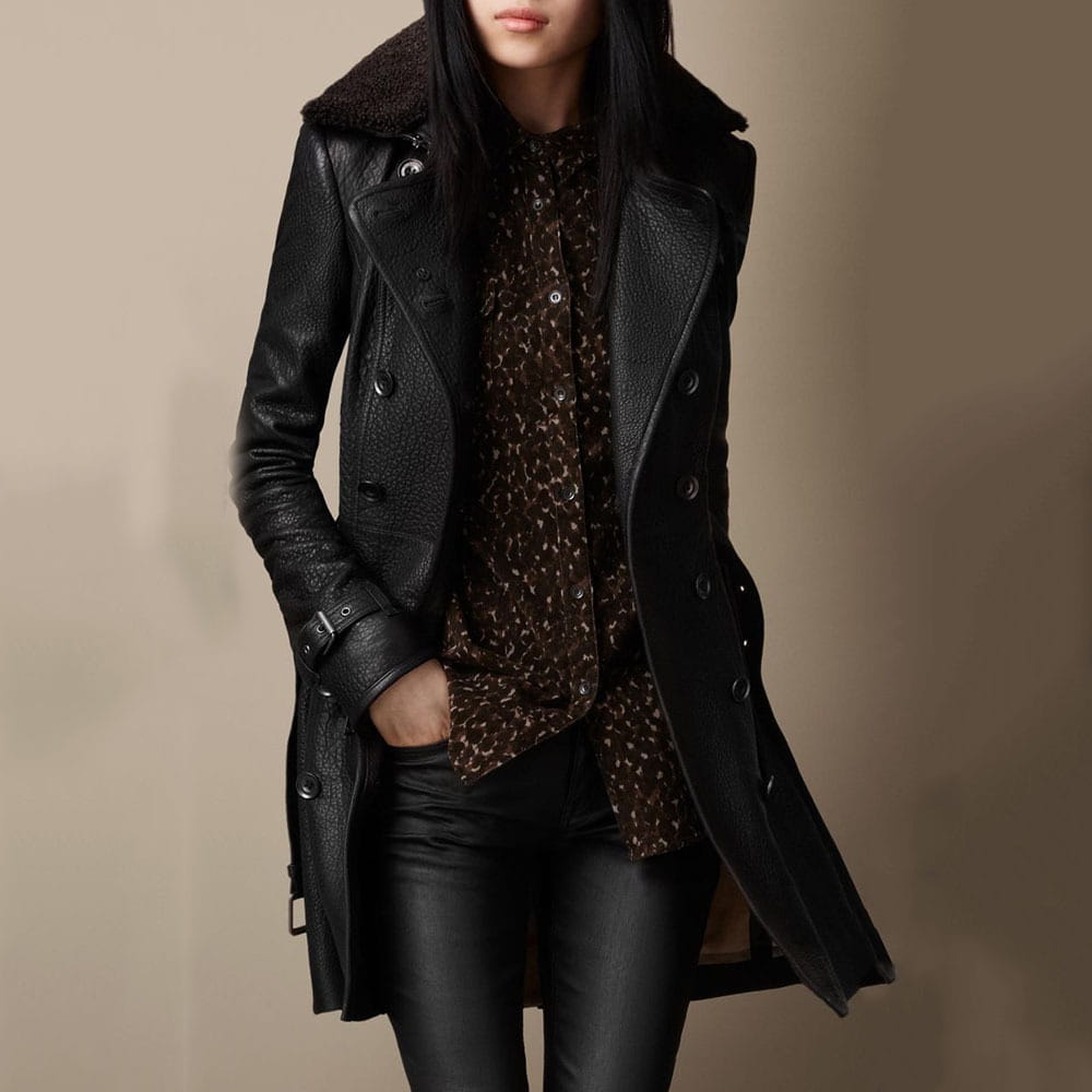 black faux leather double breasted trench coat with belt featuring a plush shearling collar
