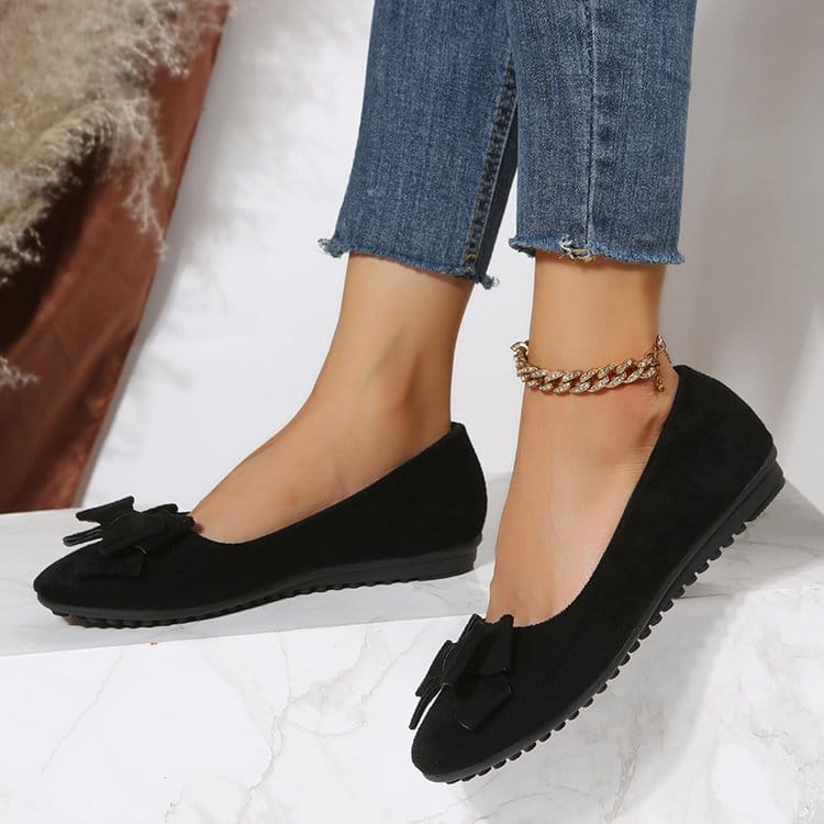 Women’s magenta suede bow round toe flat gommino loafers featuring matching bow accents for elegant wear.