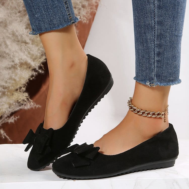 Women’s magenta suede bow round toe flat gommino loafers featuring matching bow accents for elegant wear.
