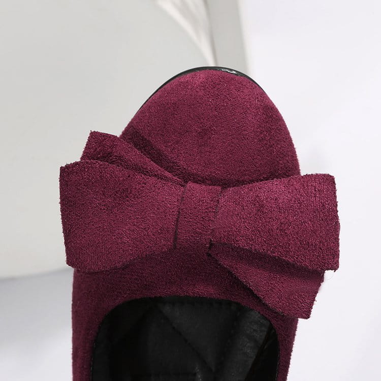 Women’s magenta suede bow round toe flat gommino loafers featuring matching bow accents for elegant wear.