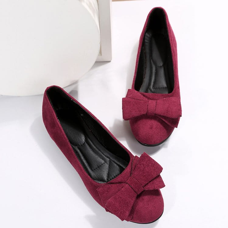 Women’s magenta suede bow round toe flat gommino loafers featuring matching bow accents for elegant wear.