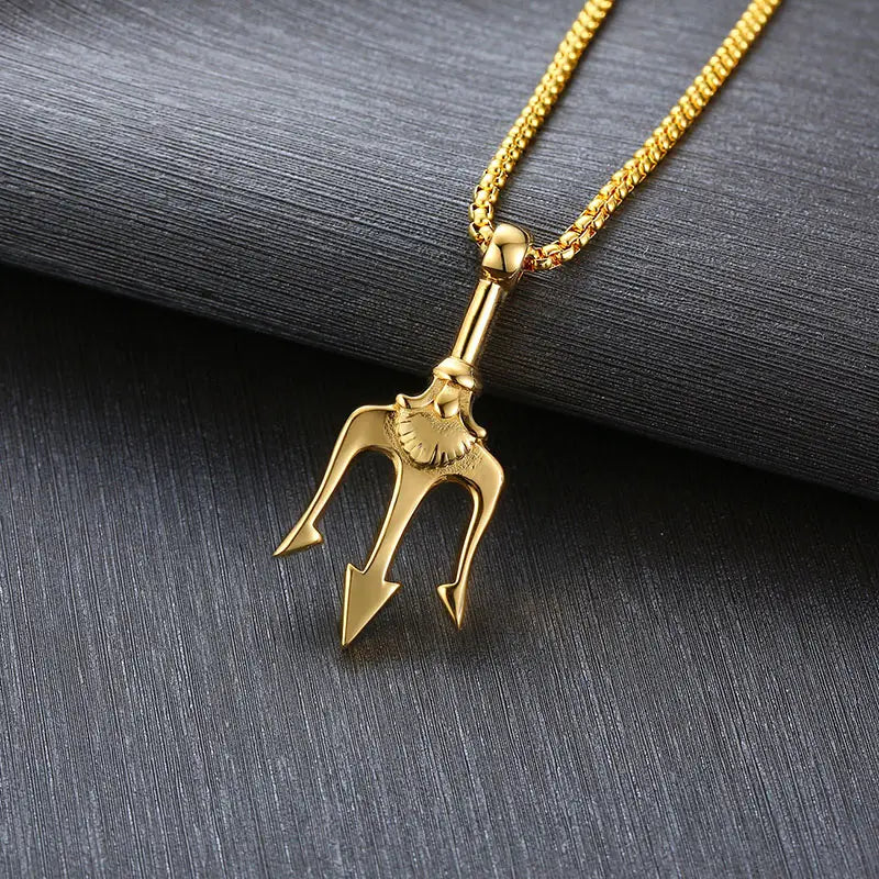 Gold-colored Poseidon trident pendant necklace with a textured chain made of titanium steel.