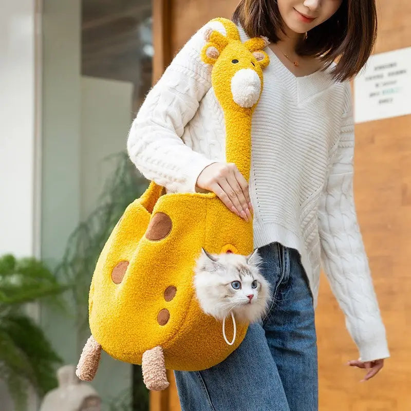Yellow plush giraffe-shaped pet carrier bag backpack with brown spots and soft fuzzy texture designed for comfortable pet transportation.
