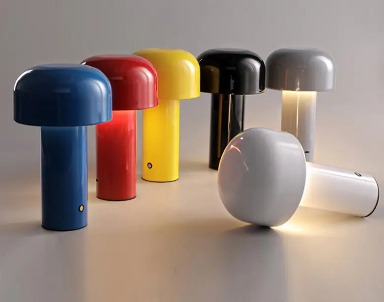 A collection of colorful mushroom table lamp cordless touch rechargeable led with glossy plastic caps and cylindrical bases in blue red yellow black gray and white.